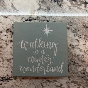 Light Blue Winter Wonderland Sign With Silver Writing